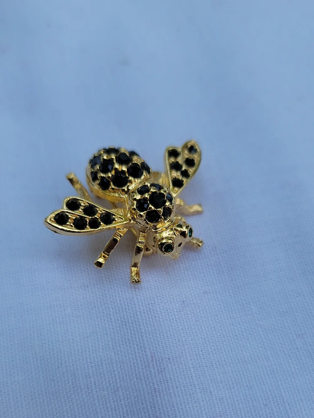 Vintage Joan Rivers Gold Bee Brooch with Black Accents Green Eyes